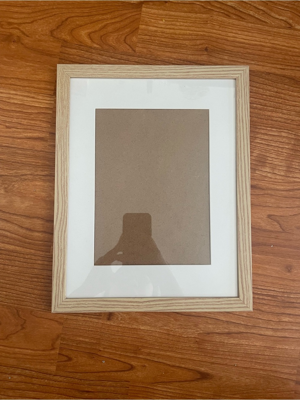 8.5x11 Light wood picture frame with white matting